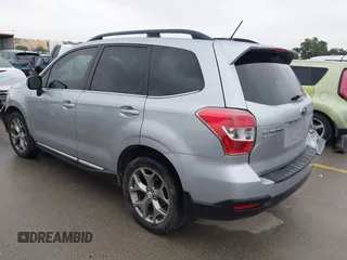 2015 Subaru Forester Touring with VIN JF2SJAUC8FH467730, listed as a IAAI auction lot 42403195 with 142,287 mi miles and . Bid and sale history available at DreamBid. Image 3.