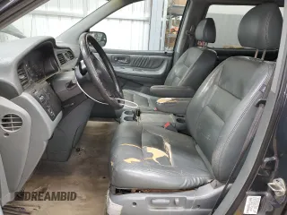 2003 Honda Odyssey EX-L z VIN 5FNRL18993B142649, wystawiony jako Copart lot #86397154 z przebiegiem 339 966 mil mil oraz Szkoda całkowita • Salvage title. Historia ofert i sprzedaży dostępna na DreamBid. Obrazek 7.