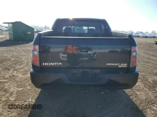 2013 Honda Ridgeline RTL z VIN 5FPYK1F52DB004376, wystawiony jako Copart lot #55990375 z przebiegiem 127 762 mil mil oraz Szkoda całkowita • Salvage title. Historia ofert i sprzedaży dostępna na DreamBid. Obrazek 6.