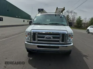 2014 Ford Econoline Cargo Commercial with VIN 1FTNE2EW0EDA80173, listed as a IAAI auction lot 41960609 with 153,746 mi miles. Bid and sale history available at carsss.com. Image 1.