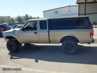 1999 Ford Ranger XL with VIN 1FTYR14X9XTA59675, listed as a IAAI auction lot 41861165 with 208,928 mi miles. Bid and sale history available at carsss.com. Image 14.