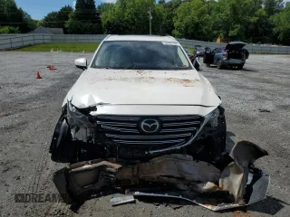 2019 Mazda CX-9 Touring z VIN JM3TCBCY9K0305038, wystawiony jako Copart lot #56707735 z przebiegiem 76 546 mil mil oraz Szkoda całkowita • Salvage title. Historia ofert i sprzedaży dostępna na DreamBid. Obrazek 5.
