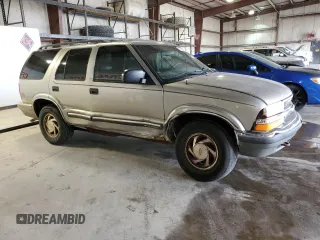 2000 Chevrolet Blazer LT z VIN 1GNDT13W1Y2282557, wystawiony jako Copart lot #55560775 z przebiegiem 219 795 mil mil oraz Szkoda całkowita • Salvage title. Historia ofert i sprzedaży dostępna na DreamBid. Obrazek 4.