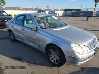 2005 Mercedes-Benz E-Class 3.2L with VIN WDBUF65JX5A718711, listed as a IAAI auction lot 41625603 with 145,024 mi miles. Bid and sale history available at carsss.com. Image 1.