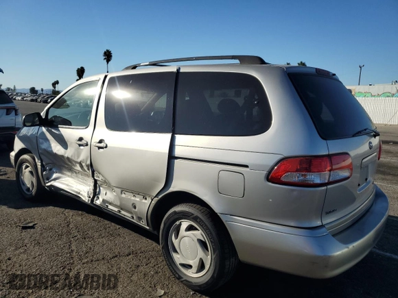 2002 Toyota Sienna LE with VIN 4T3ZF13C52U505287, listed as a Copart auction lot 77164884 with 0 mi miles and Salvage Title. Bid and sale history available at carsss.com. Image 2.