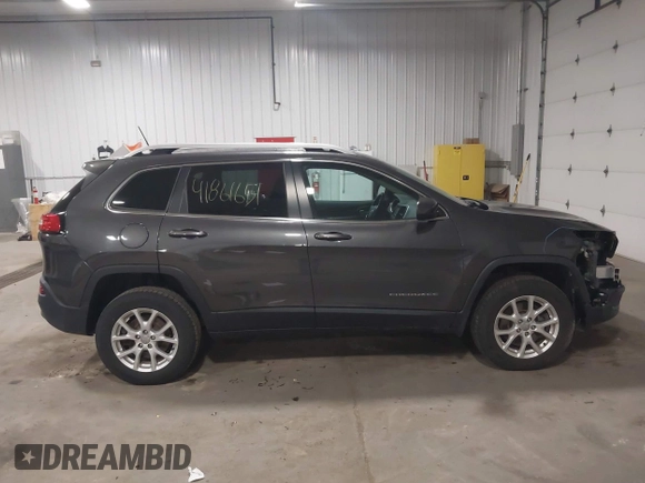 2014 Jeep Cherokee Altitude with VIN 1C4PJMCB2EW317346, listed as a IAAI auction lot 41861651 with 100,602 mi miles. Bid and sale history available at carsss.com. Image 13.