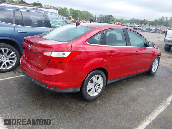 2012 Ford Focus SEL with VIN 1FAHP3H27CL338414, listed as a IAAI auction lot 41925915 with 128,123 mi miles. Bid and sale history available at carsss.com. Image 4.