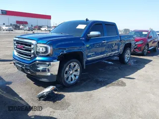 2018 GMC Sierra 1500 SLT z VIN 3GTU2NEC8JG254323, wystawiony jako IAAI lot #41772180 z przebiegiem 157 143 mil mil oraz . Historia ofert i sprzedaży dostępna na DreamBid. Obrazek 2.