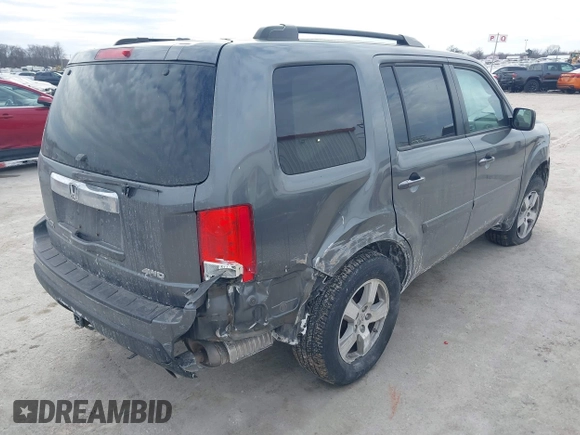 2011 Honda Pilot EX-L with VIN 5FNYF4H59BB042308, listed as a IAAI auction lot 41635511 with 196,736 mi miles and . Bid and sale history available at carsss.com. Image 4.