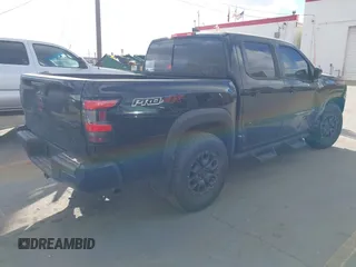 2023 Nissan Frontier SV with VIN 1N6ED1EK0PN658048, listed as a IAAI auction lot 41383407 with 13,744 mi miles and . Bid and sale history available at DreamBid. Image 4.