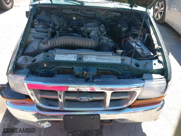 1999 Ford Ranger XLT with VIN 1FTZR15X0XPA00817, listed as a IAAI auction lot 41855947 with 215,786 mi miles. Bid and sale history available at carsss.com. Image 10.