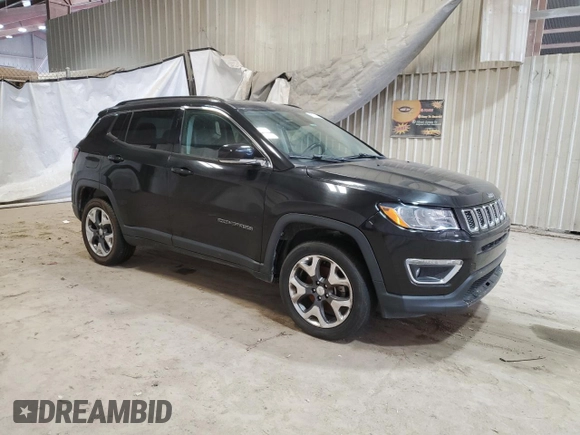 2018 Jeep Compass Limited with VIN 3C4NJDCBXJT399754, listed as a Copart auction lot 52698695 with 99,960 mi miles and Clean Title. Bid and sale history available at DreamBid. Image 4.