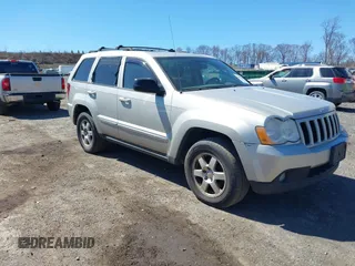 2010 Jeep Grand Cherokee Laredo with VIN 1J4PR4GK2AC125918, listed as a IAAI auction lot 41899078 with 236,229 mi miles. Bid and sale history available at carsss.com. Image 1.