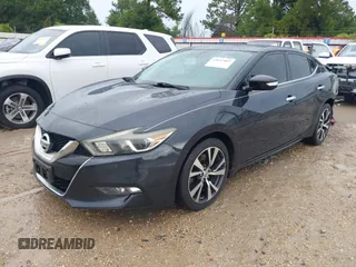2016 Nissan Maxima SV with VIN 1N4AA6AP8GC426999, listed as a IAAI auction lot 42627802 with 160,643 mi miles and . Bid and sale history available at DreamBid. Image 2.