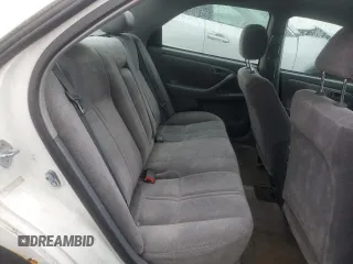 1999 Toyota Camry LE z VIN 4T1BG22K4XU485515, wystawiony jako Copart lot #55110155 z przebiegiem 230 079 mil mil oraz Czysty tytuł • Clean title. Historia ofert i sprzedaży dostępna na DreamBid. Obrazek 10.
