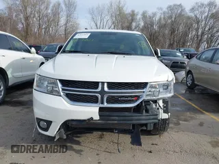 2016 Dodge Journey SXT with VIN 3C4PDCBG0GT206463, listed as a IAAI auction lot 41832864 with 135,409 mi miles. Bid and sale history available at carsss.com. Image 6.