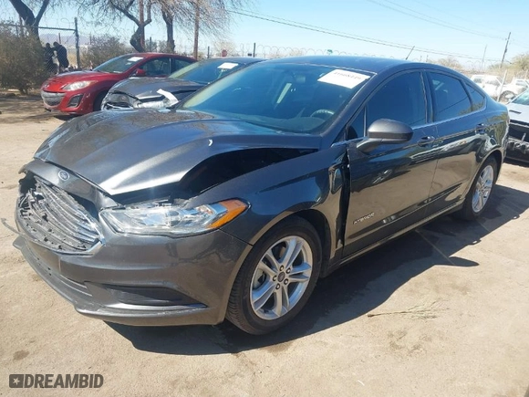 2018 Ford Fusion Hybrid SE with VIN 3FA6P0LU0JR225031, listed as a IAAI auction lot 41668449 with 96,142 mi miles. Bid and sale history available at carsss.com. Image 2.