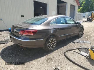 2014 Volkswagen CC VR6 Executive 4Motion with VIN WVWGU7AN3EE539874, listed as a Copart auction lot 61742974 with 124,358 mi miles and Salvage Title. Bid and sale history available at carsss.com. Image 3.