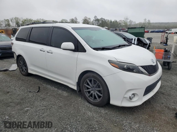 2015 Toyota Sienna SE with VIN 5TDXK3DCXFS670630, listed as a Copart auction lot 51305415 with 142,892 mi miles and Salvage Title. Bid and sale history available at carsss.com. Image 4.