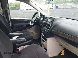 2011 Dodge Grand Caravan SXT with VIN 2D4RN4DGXBR633009, listed as a IAAI auction lot 42177861 with 119,901 mi miles and . Bid and sale history available at DreamBid. Image 5.