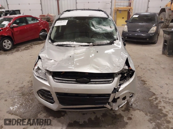 2014 Ford Escape SE z VIN 1FMCU9GX1EUD67624, wystawiony jako IAAI lot #41986362 z przebiegiem 79 921 mil mil oraz . Historia ofert i sprzedaży dostępna na DreamBid. Obrazek 12.