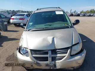 2005 Dodge Caravan SXT with VIN 2D8GP44L05R459369, listed as a IAAI auction lot 42638057 with 76,777 mi miles and . Bid and sale history available at DreamBid. Image 12.