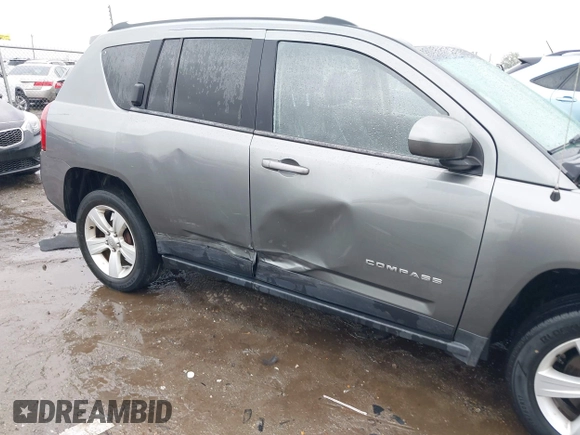 2014 Jeep Compass Latitude with VIN 1C4NJCEB2ED522109, listed as a IAAI auction lot 40282558 with 168,954 mi miles and . Bid and sale history available at carsss.com. Image 6.