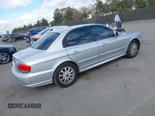 2003 Hyundai Sonata GLS with VIN KMHWF35H93A897855, listed as a IAAI auction lot 41527610 with 122,010 mi miles. Bid and sale history available at carsss.com. Image 4.