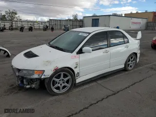 2005 Mitsubishi Lancer Evolution VIII with VIN JA3AH86D45U028033, listed as a Copart auction lot 74323774 with 204,046 mi miles and Salvage Title. Bid and sale history available at carsss.com. Image 1.