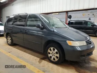 2003 Honda Odyssey EX-L z VIN 5FNRL18993B142649, wystawiony jako Copart lot #86397154 z przebiegiem 339 966 mil mil oraz Szkoda całkowita • Salvage title. Historia ofert i sprzedaży dostępna na DreamBid. Obrazek 4.