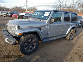 2018 Jeep Wrangler Unlimited Sahara z VIN 1C4HJXEN4JW173435, wystawiony jako IAAI lot #41453040 z przebiegiem 51 530 mil mil oraz . Historia ofert i sprzedaży dostępna na DreamBid. Obrazek 2.
