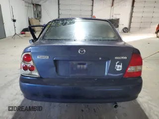 2000 Mazda Protege ES with VIN JM1BJ221XY0211385, listed as a Copart auction lot 48225605 with Not Provided miles and Non Repairable. Bid and sale history available at DreamBid. Image 6.