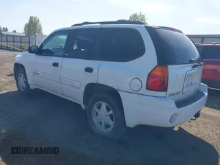 2003 GMC Envoy SLT with VIN 1GKDT13S232394707, listed as a IAAI auction lot 42084139 with 192,416 mi miles. Bid and sale history available at carsss.com. Image 3.