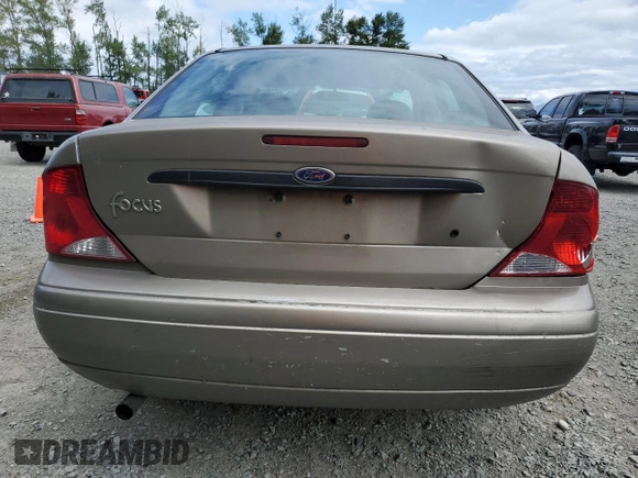 2004 Ford Focus LX with VIN 1FAFP33P24W148563, listed as a Copart auction lot 63869755 with 142,243 mi miles and Salvage title. Bid and sale history available at DreamBid. Image 6.