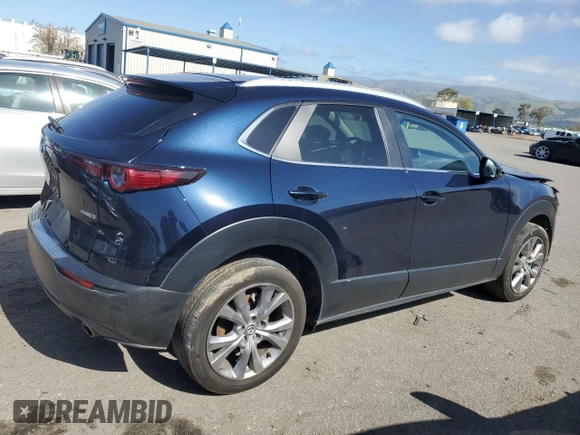 2023 Mazda CX-30 S Carbon Edition with VIN 3MVDMBCM1PM582423, listed as a Copart auction lot 47998275 with 35,412 mi miles and Salvage title. Bid and sale history available at DreamBid. Image 3.