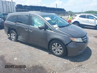 2014 Honda Odyssey EX-L with VIN 5FNRL5H66EB003479, listed as a IAAI auction lot 42673047 with 66,448 mi miles and . Bid and sale history available at DreamBid. Image 1.