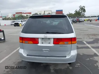 2003 Honda Odyssey EX-L with VIN 5FNRL18943B030373, listed as a IAAI auction lot 41867289 with 179,718 mi miles and . Bid and sale history available at DreamBid. Image 16.