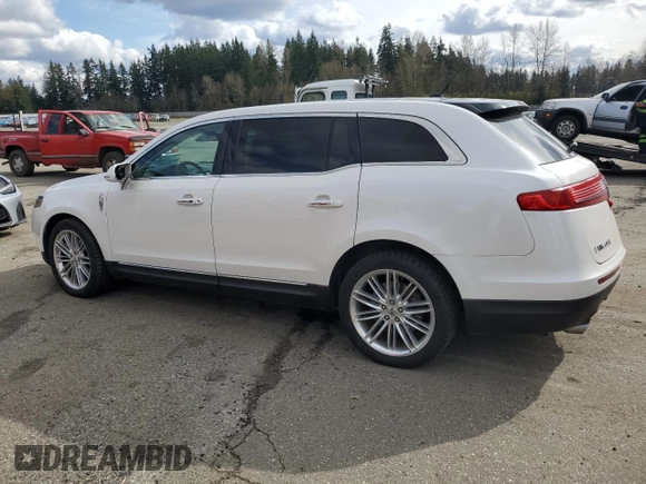 2014 Lincoln MKT EcoBoost with VIN 2LMHJ5ATXEBL58623, listed as a Copart auction lot 48222015 with 255,495 mi miles and Clean Title. Bid and sale history available at DreamBid. Image 2.