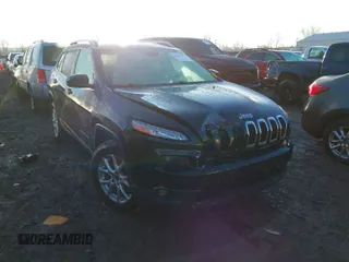 2015 Jeep Cherokee Latitude z VIN 1C4PJMCS0FW512153, wystawiony jako IAAI lot #41649376 z przebiegiem 147 910 mil mil oraz . Historia ofert i sprzedaży dostępna na DreamBid. Obrazek 1.