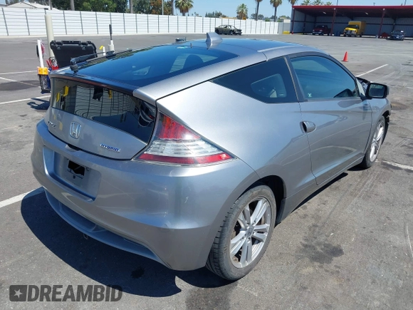 2011 Honda CR-Z EX with VIN JHMZF1D66BS002867, listed as a IAAI auction lot 42520026 with 198,339 mi miles and . Bid and sale history available at DreamBid. Image 4.