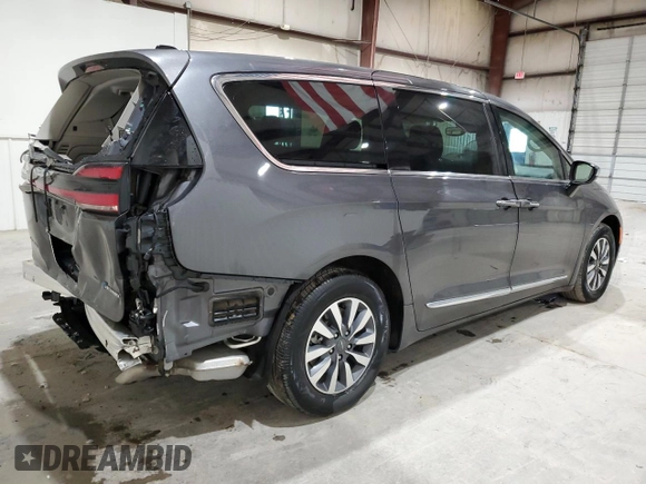 2023 Chrysler Pacifica Hybrid Limited с VIN 2C4RC1S75PR592297, выставлен на аукционе Copart как лот 53637925 с пробегом 39 249 миль миль и Списание • Salvage title. История ставок и продаж доступна на DreamBid. Изображение 3.