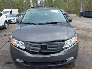 2013 Honda Odyssey Touring with VIN 5FNRL5H94DB013310, listed as a IAAI auction lot 42079565 with 128,622 mi miles and . Bid and sale history available at carsss.com. Image 12.