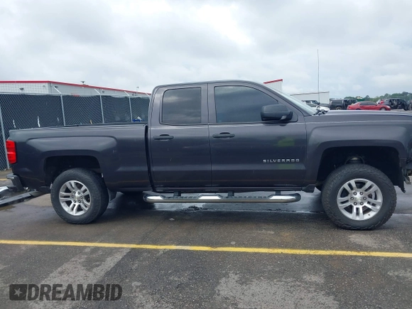 2014 Chevrolet Silverado 1500 LT with VIN 1GCRCREC5EZ161985, listed as a IAAI auction lot 42096479 with 225,412 mi miles and . Bid and sale history available at DreamBid. Image 14.