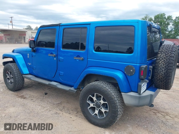 2016 Jeep Wrangler Unlimited 75th Anniversary with VIN 1C4HJWEG0GL154418, listed as a IAAI auction lot 42192717 with 102,514 mi miles and . Bid and sale history available at DreamBid. Image 3.
