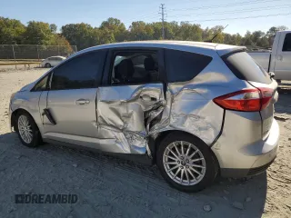 2013 Ford C-Max SE with VIN 1FADP5AU0DL530183, listed as a Copart auction lot 76034924 with 211,682 mi miles and Salvage Title. Bid and sale history available at carsss.com. Image 2.
