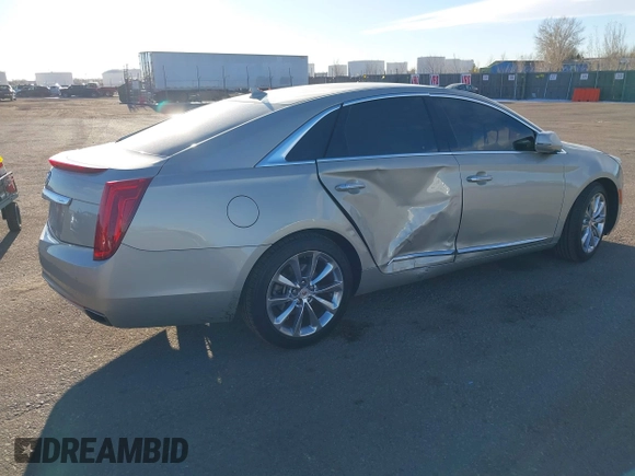 2014 Cadillac XTS Luxury z VIN 2G61N5S3XE9298471, wystawiony jako IAAI lot #41069292 z przebiegiem 92 112 mil mil oraz . Historia ofert i sprzedaży dostępna na DreamBid. Obrazek 4.