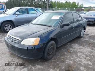 2002 Honda Civic LX with VIN 1HGES16552L060982, listed as a IAAI auction lot 42141884 with 202,659 mi miles and . Bid and sale history available at DreamBid. Image 2.