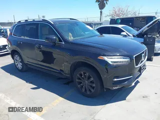 2016 Volvo XC90 T6 Momentum with VIN YV4A22PK1G1074286, listed as a IAAI auction lot 42202492 with 104,791 mi miles and . Bid and sale history available at DreamBid. Image 1.