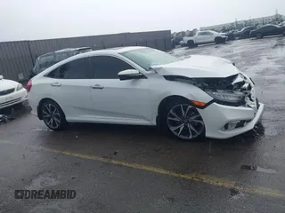 2020 Honda Civic Sedan Touring with VIN 19XFC1F91LE210390, listed as a IAAI auction lot 41766652 with 67,269 mi miles. Bid and sale history available at carsss.com. Image 13.