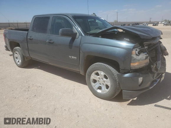 2018 Chevrolet Silverado 1500 LT with VIN 3GCUKREC2JG259864, listed as a Copart auction lot 49451735 with 146,576 mi miles and Salvage Title. Bid and sale history available at DreamBid. Image 4.